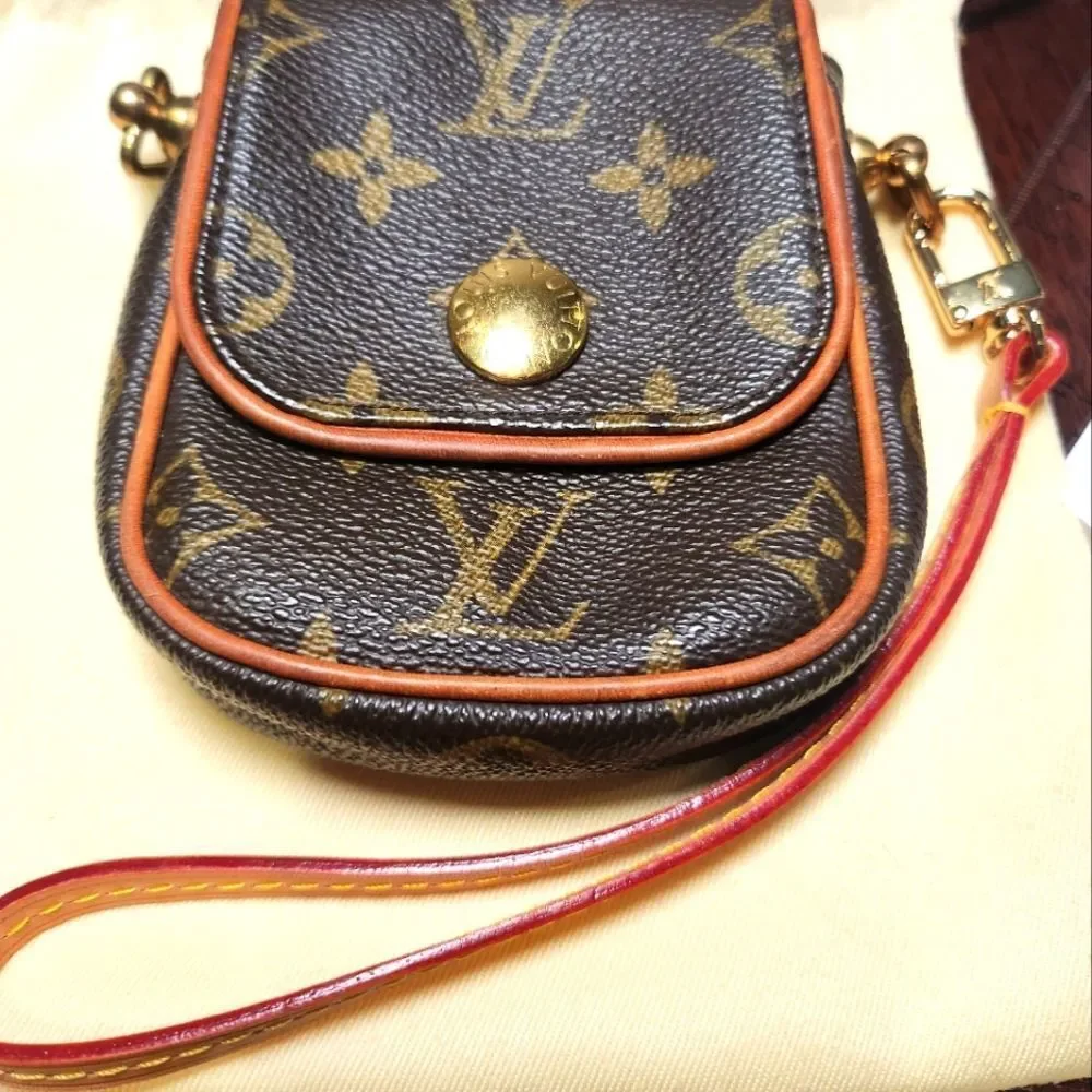 Louis Vuitton Pochette Cancun Monogram Mini Bag